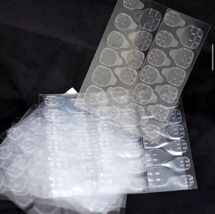 Adhesive tabs