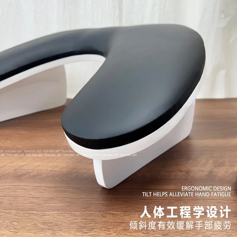 Angled arm rest