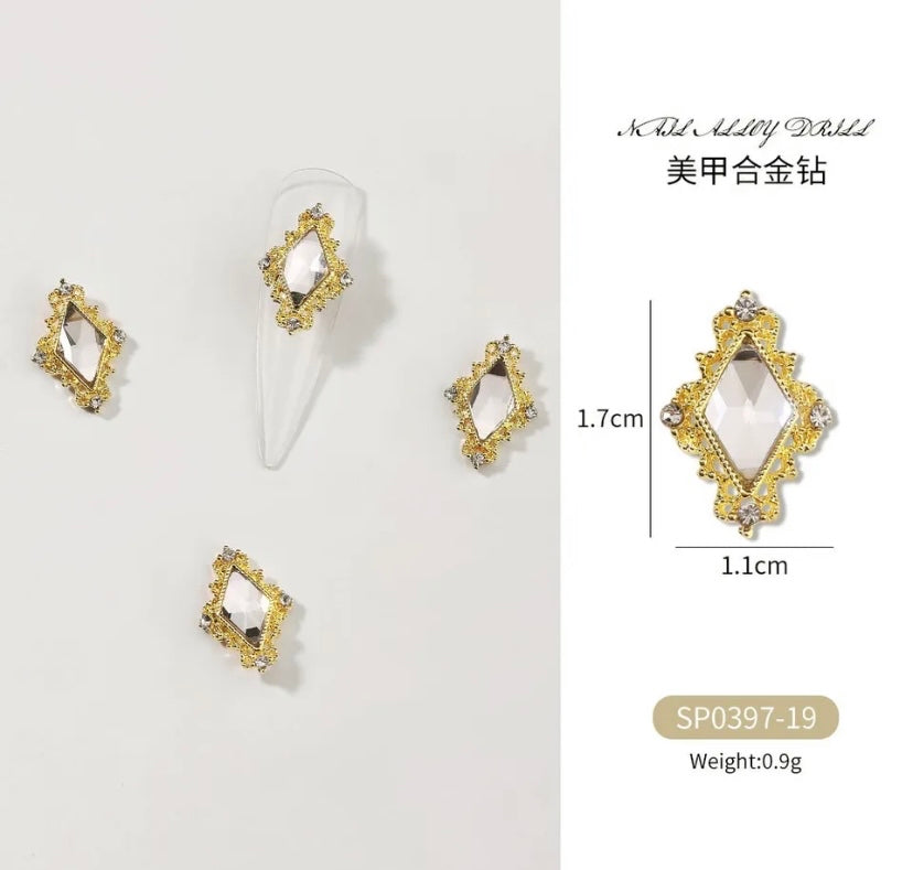 A set of Zircon Variety Charms gold and diamond stud earrings by Luxenailhaven.