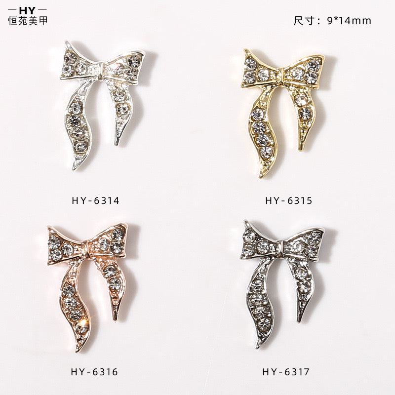 Zircon bow charms