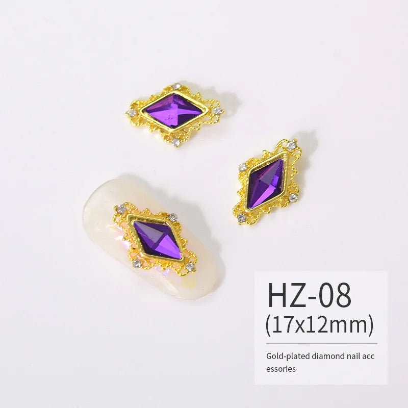 A variety of Luxenailhaven Zircon Variety Charms on a white background.