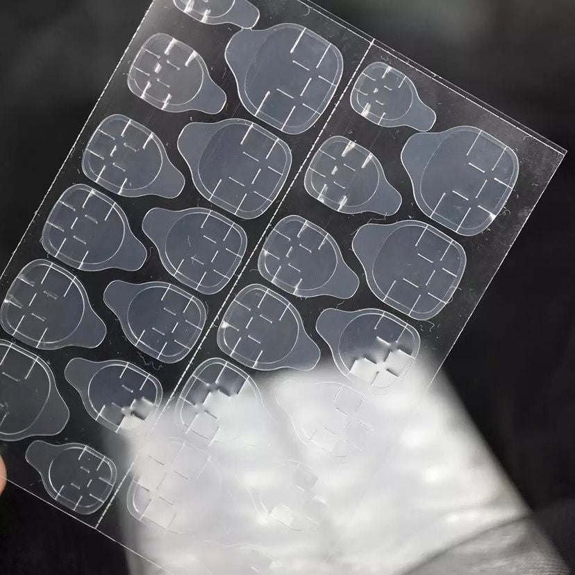 Adhesive tabs