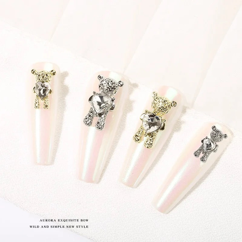Three Zircon Teddy Charms on a white background by Luxenailhaven.
